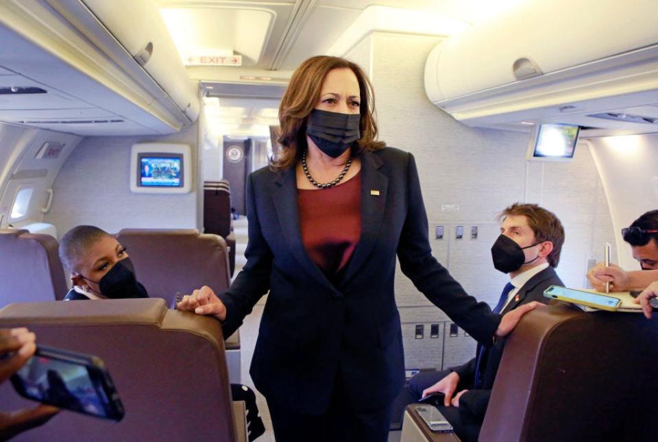 Kamala Harris speaks to reporters on Air Force Two