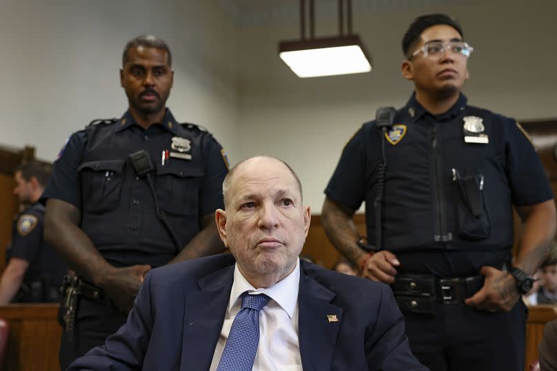 Former film producer Harvey Weinstein, left, appears in Manhattan Criminal Court for a status hearing to be retried - Tuesday 9 July 2024