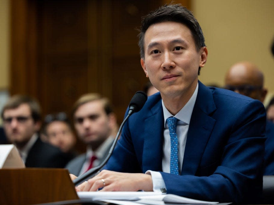 TikTok CEO Shou Zi Chew listens to questions from U.S. representatives during his testimony at a Congressional hearing