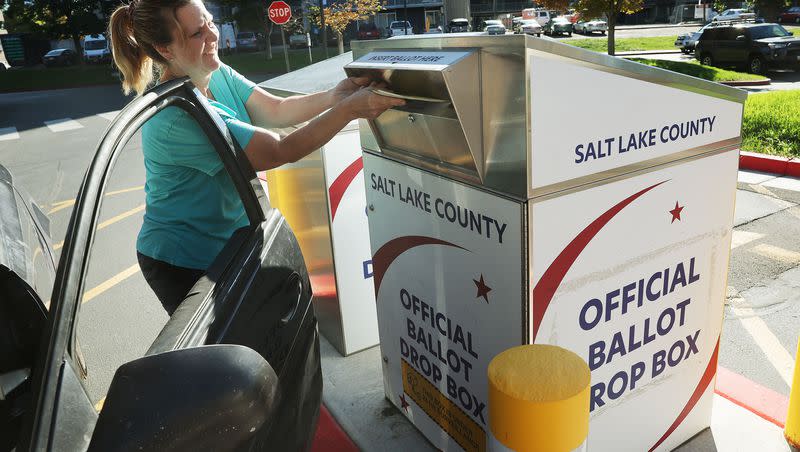 Tracy Ashcraft drops off her ballot during Utah’s municipal and primary elections, which includes the 2nd Congressional District special primary, at the Salt Lake County Government Center in Salt Lake City on Tuesday, Sept. 5, 2023.