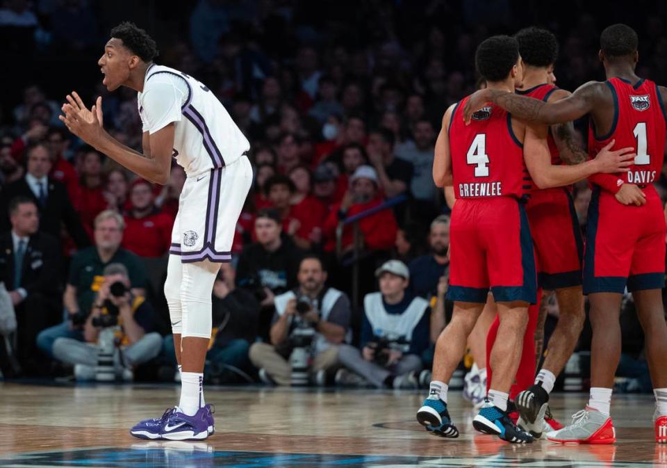 Kansas State’s Nae’Qwan Tomlin can’t believe a foul call against him on Florida Atlantic three point attempt during the second half of their east region final game at Madison Square Garden on Saturday night.