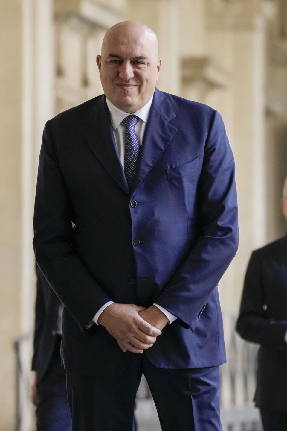 Newly appointed Defense Minister Guido Crosetto arrives at Quirinal presidential palace to be sworn in, Saturday, Oct. 22, 2022. Giorgia Meloni on Friday formed Italy's new ruling coalition, assembling the country's first far-right-led government since the end of World War II and becoming the first woman to obtain the premiership. (AP Photo/Andrew Medichini)