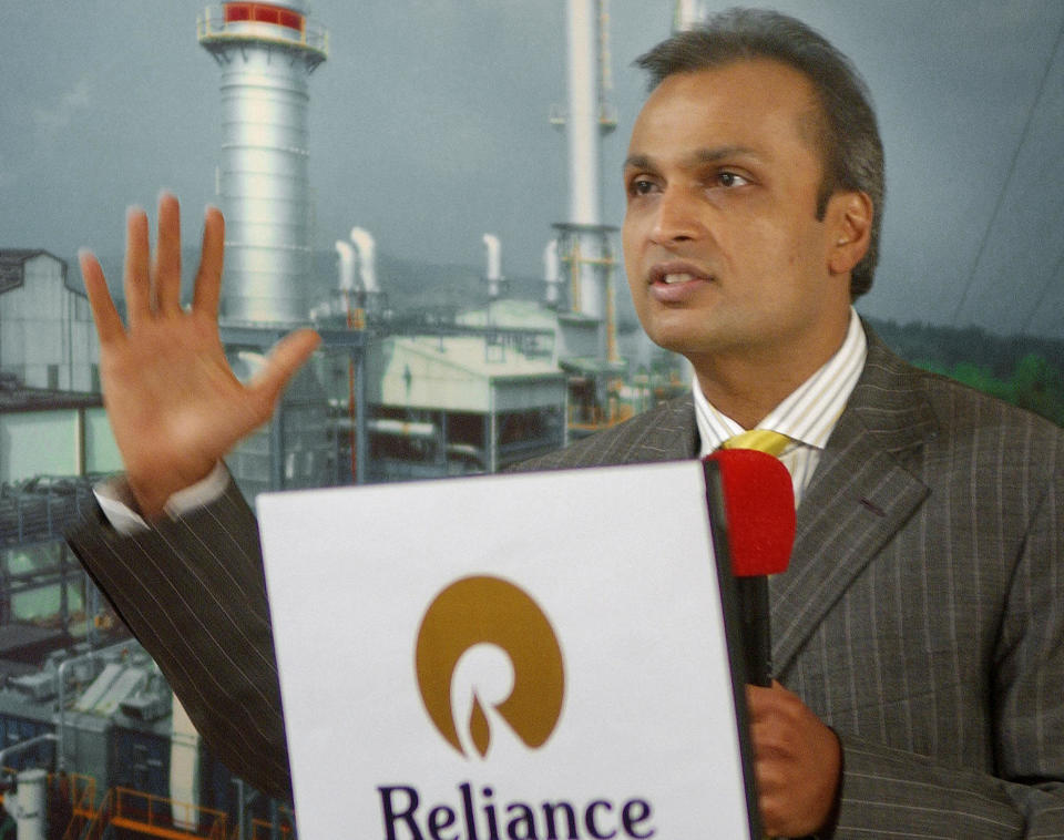 India's largest private sector group Reliance Industries Ltd Vice Chairman and Managing Director Anil Ambani gestures as he announces the company's results of the year in Bombay, 29 April 2004. India's biggest petrochemicals producer, Reliance Industries, posted a 26 percent rise in full year net profit to 51.60 billion rupees (1.16 billion dollars), helped by surging fuel and chemical prices. AFP PHOTO/Sebastian D'SOUZA.