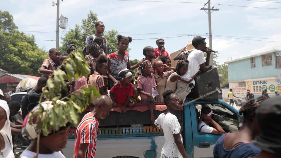 Demonstrators in Haiti call Monday for the release of Dorsainvil and her daughter.  - Odelyn Joseph/AP