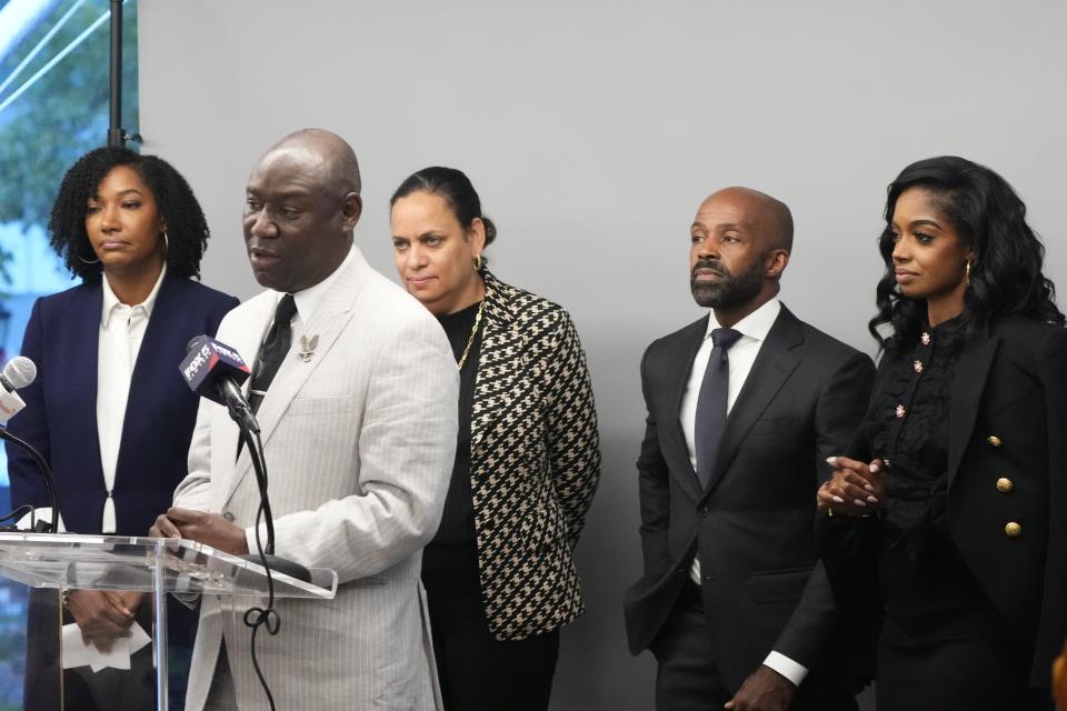 Attorney Ben Crump, speaks as Ayana Parsons, left, and Arian Simone, right, of Fearless Fund, listen during a news conference Thursday, Aug. 10, 2023, in New York. Attorneys for an Atlanta-based venture capital firm being sued over a grant program investing in Black women have vowed to fight back against the lawsuit calling it misguided and frivolous. (AP Photo/Frank Franklin II)