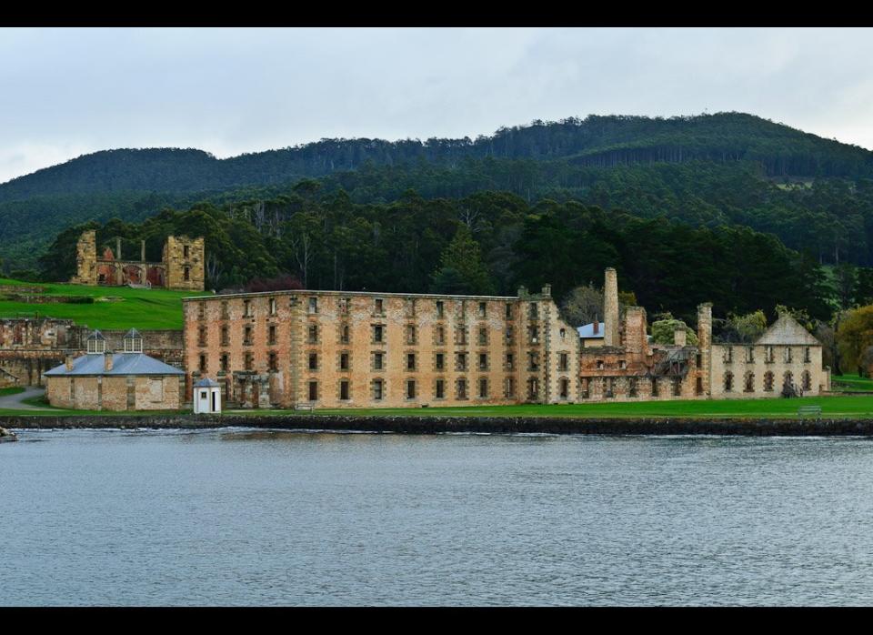 An important site in <a href="http://www.cheapflights.com/flights-to-australia/" target="_hplink">Australia</a>’s colonial history, Port Arthur first started life as a timber station before it became famous as a penal colony.    From 1833 to 1853, Port Arthur was home to the most hardened, convicted British criminals including those who re-offended after their arrival in Australia and rebellious prisoners from other facilities. It was known for having some of the strictest security measures around.    Reverend John Manton selected the Isle of the Dead, originally called Opossum Island, as the site of Port Arthur graveyard. Between 1833 and 1877, around 1,000 burials took place on the island. Convicts were forbidden from having headstones and were buried in unmarked graves on the lower south east of the island. Workers and their families were given the dignity of a headstone and were buried higher up on the island.    As time went on, the ban on prisoner headstones was relaxed and the first convict gravestone appeared in 1854.    It is possible to visit the island today with a guided boat tour from Port Arthur.