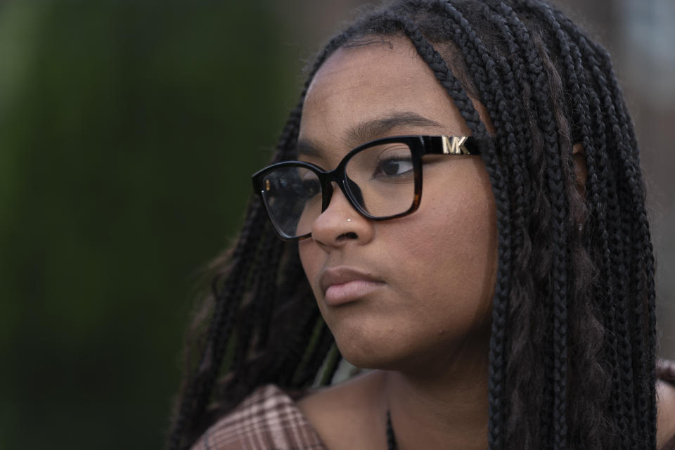 Harmony Kennedy, 16, a high school student, sits for a portrait in Nolensville, Tenn., on Tuesday, May 16, 2023. As protests for racial justice broke out in 2020, white students at her Tennessee high school kneeled in the hallways and chanted “Black Lives Matter” in mocking tones. As she saw the students receive light punishments, she grew increasingly frustrated. (AP Photo/George Walker IV)