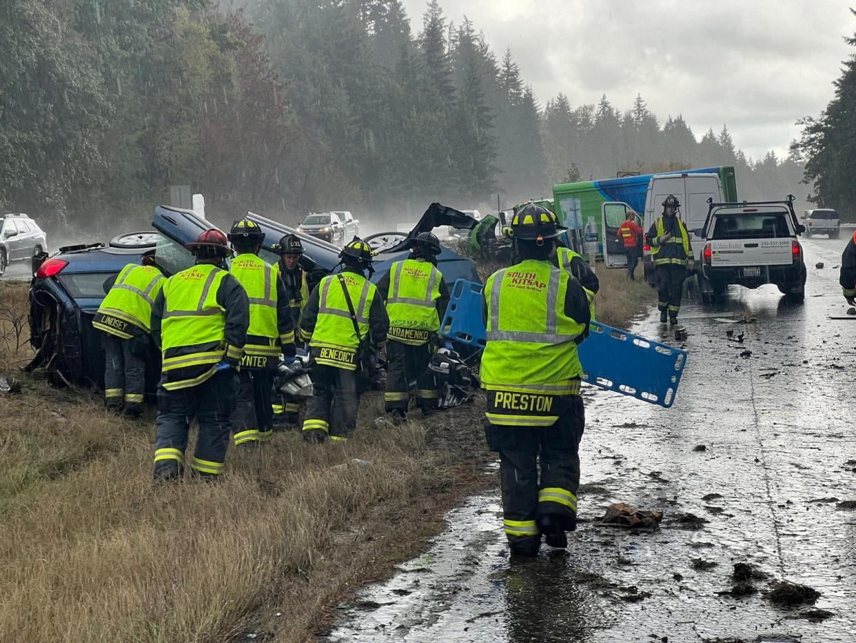 First responders work at the scene of a crash along Highway 16 on Wednesday afternoon.