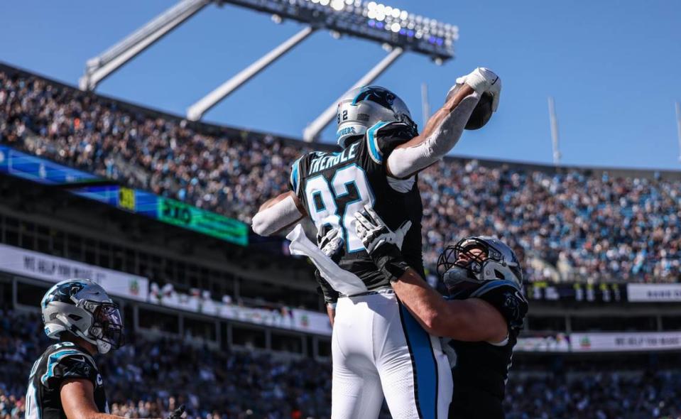 Carolina Panthers tight end Tommy Tremble celebrates a touchdown with Carolina Panthers guard Austin Corbett against the Houston Texans at the Bank of America Stadium in Charlotte, N.C., on Sunday, October 29, 2023. Khadejeh Nikouyeh/Knikouyeh@charlotteobserver.com