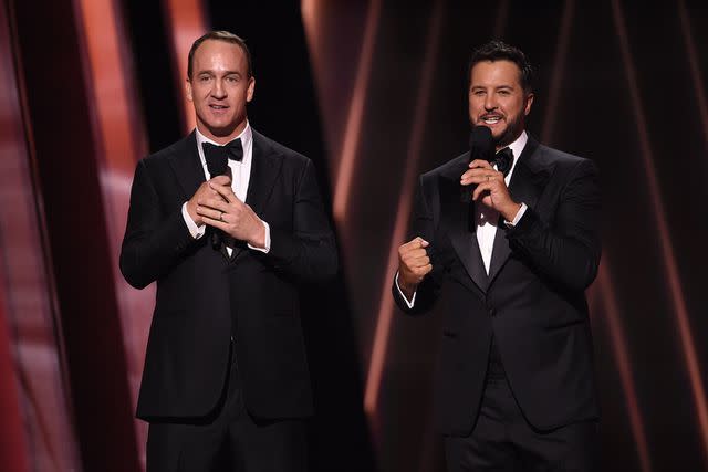 <p>ABC via Getty</p> Peyton Manning and Luke Bryan at the 2022 CMA Awards