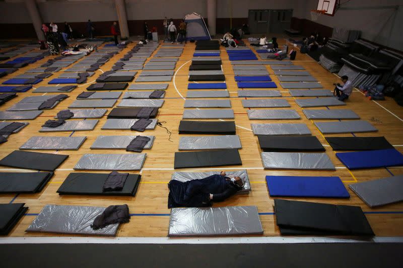 Ukrainians who fled to Mexico amid Russia's invasion of their homeland, arrive at a shelter to wait to enter into the United States near the border between Mexico and U.S., in Tijuana