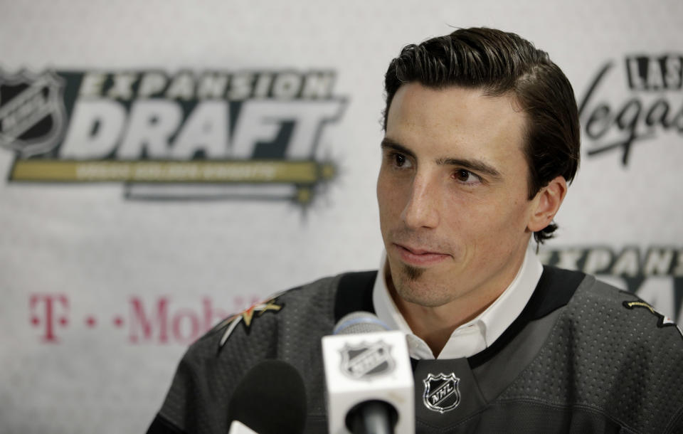 FILE - Vegas Golden Knights' Marc-Andre Fleury speaks with the media in Las Vegas, in this Wednesday, June 21, 2017, file photo. This was an unprecedented offseason of goaltender movement around the NHL. Vegas traded Vezina Trophy winner Marc-Andre Fleury to Chicago. Fleury was the face of the Golden Knights franchise, and received assurances from Vegas owner Bill Foley that he'd retire there. (AP Photo/John Locher, File)