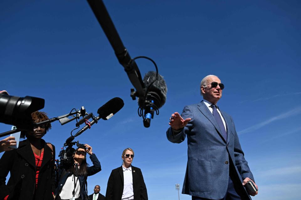 President Joe Biden speaks to the press before boarding Air Force One, as he departs for Northern Ireland, at Joint Base Andrews in Maryland on April 11, 2023.