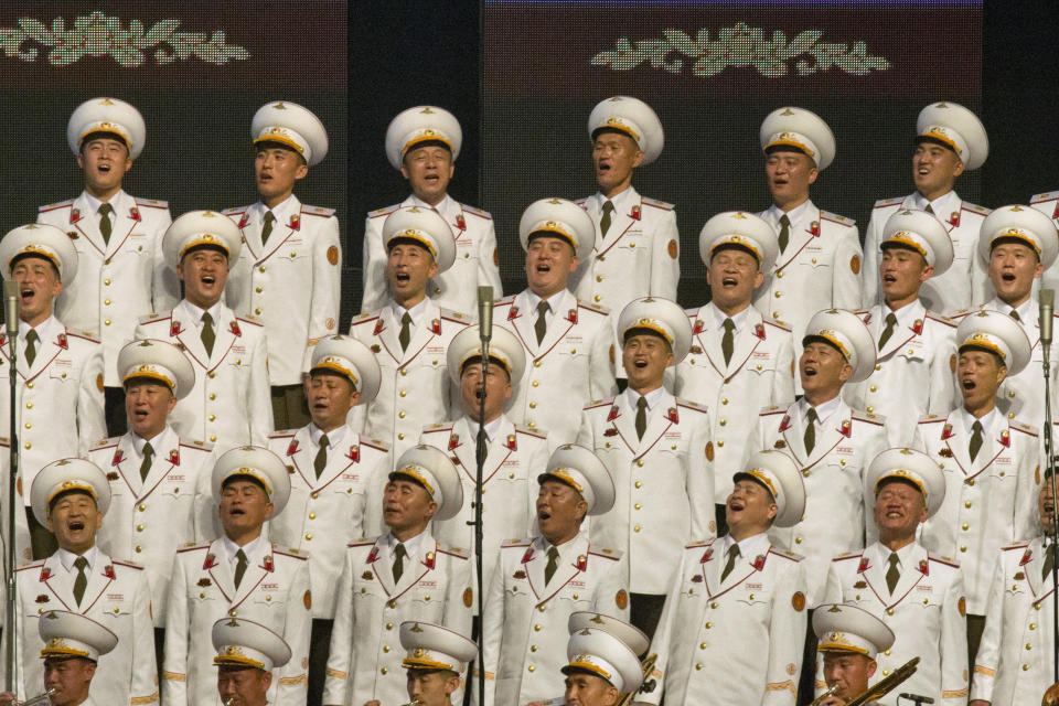 North Korean military choir members sing during an evening gala held on the eve of the 70th anniversary of North Korea's founding day in Pyongyang, North Korea, Saturday, Sept. 8, 2018. North Korea will be staging a major military parade, huge rallies and reviving its iconic mass games on Sunday to mark its 70th anniversary as a nation. (AP Photo/Ng Han Guan)
