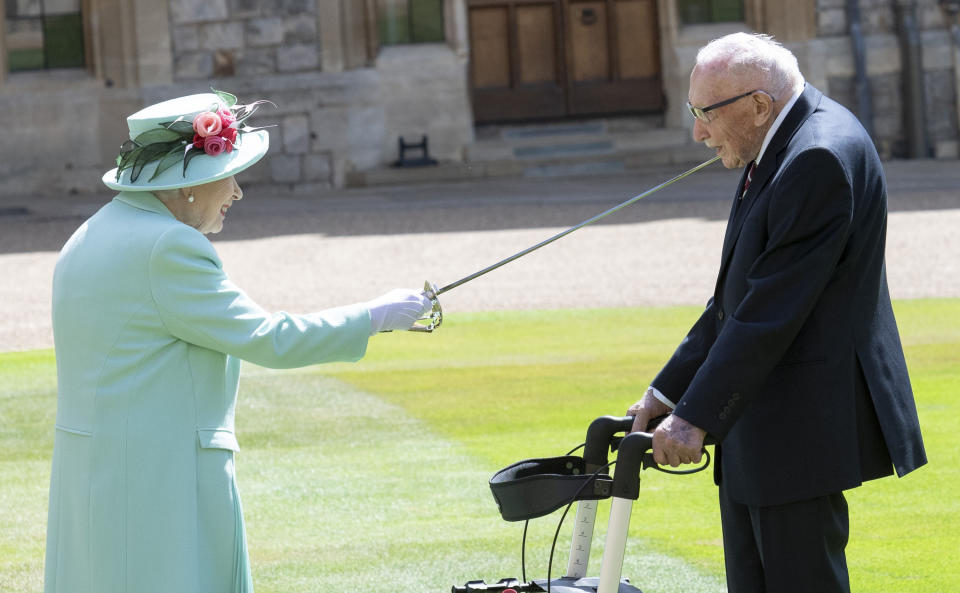 Photo by: zz/KGC-178/STAR MAX/IPx 2020 7/17/20 Captain Thomas Moore - 100 years of age and veteran of World War II - receives his Knighthood from Her Majesty Queen Elizabeth II on July 17, 2020 on the grounds of Windsor Castle in Windsor, England, UK.