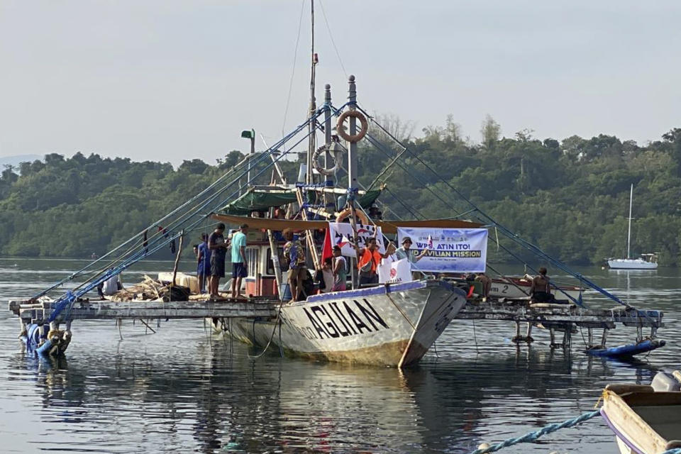 In this photo provided by Atin-Ito/Akbayan Party, activists and volunteers begin their journey at Masinloc, Zambales province, northwestern Philippines on Wednesday May 15, 2024. A flotilla of about 100 mostly small fishing boats led by Filipino activists sailed Wednesday to a disputed shoal in the South China Sea, where Beijing's coast guard and suspected militia ships have used powerful water cannons to ward off what they regard as intruders. (Atin-Ito/Akbayan Party via AP)