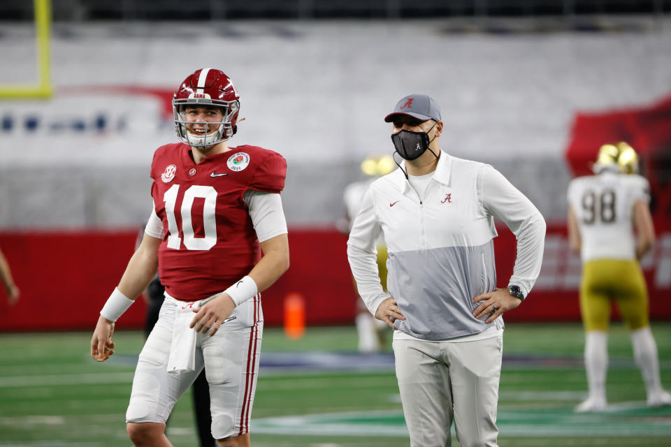 DALLAS, TX - JANUARY 1: Mac Jones #10 and Steve Sarkisian of the Alabama Crimson Tide before the game against the Notre Dame Fighting Irish in the Rose Bowl College Football Playoff Semifinal game at AT&T Stadium on January 1, 2021 in Dallas, Texas. (Photo by UA Athletics/Collegiate Images/Getty Images)