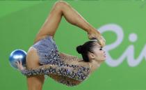 <p>Japan’s Kaho Minagawa performs during the rhythmic gymnastics individual all-around qualifications at the 2016 Summer Olympics in Rio de Janeiro, Brazil, Friday, Aug. 19, 2016. (AP Photo/Rebecca Blackwell) </p>