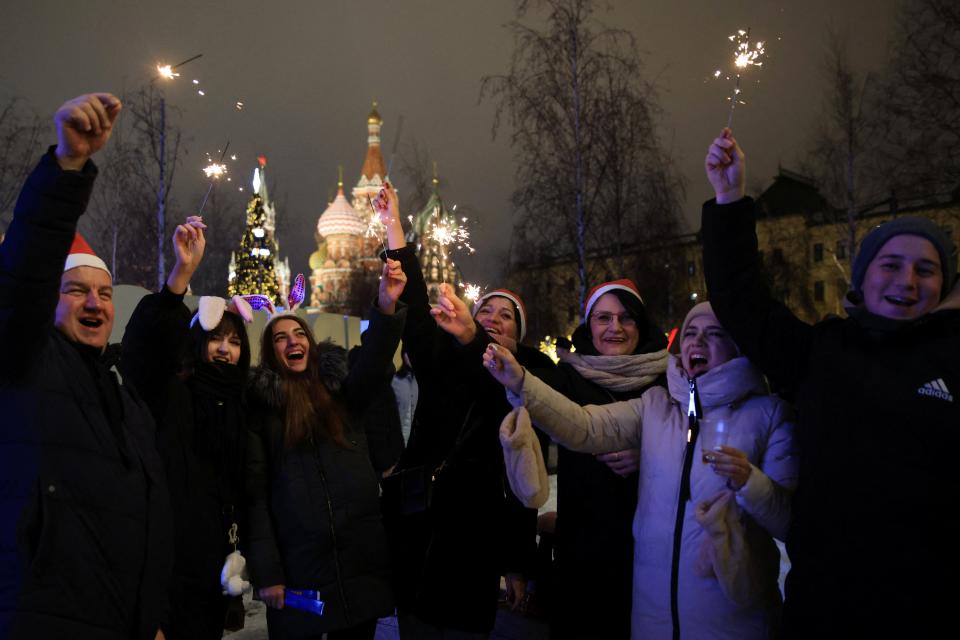 People attend the New Year's Eve celebrations in central Moscow, Russia (REUTERS)