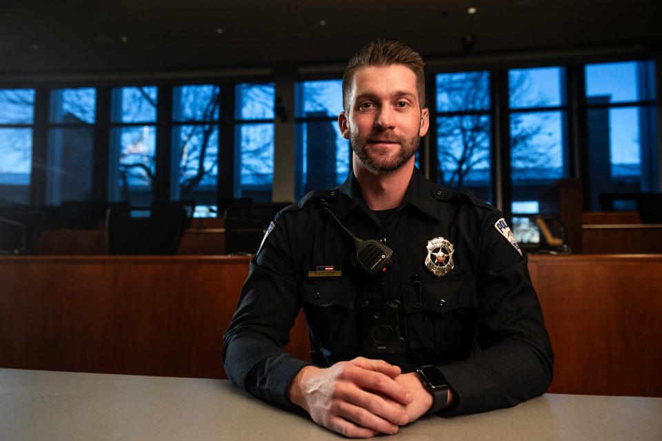 Fort Collins Police Officer Robert Holder, who recently graduated from the police academy, sits for a portrait at the Fort Collins Police Services headquarters in Fort Collins on Dec. 29.