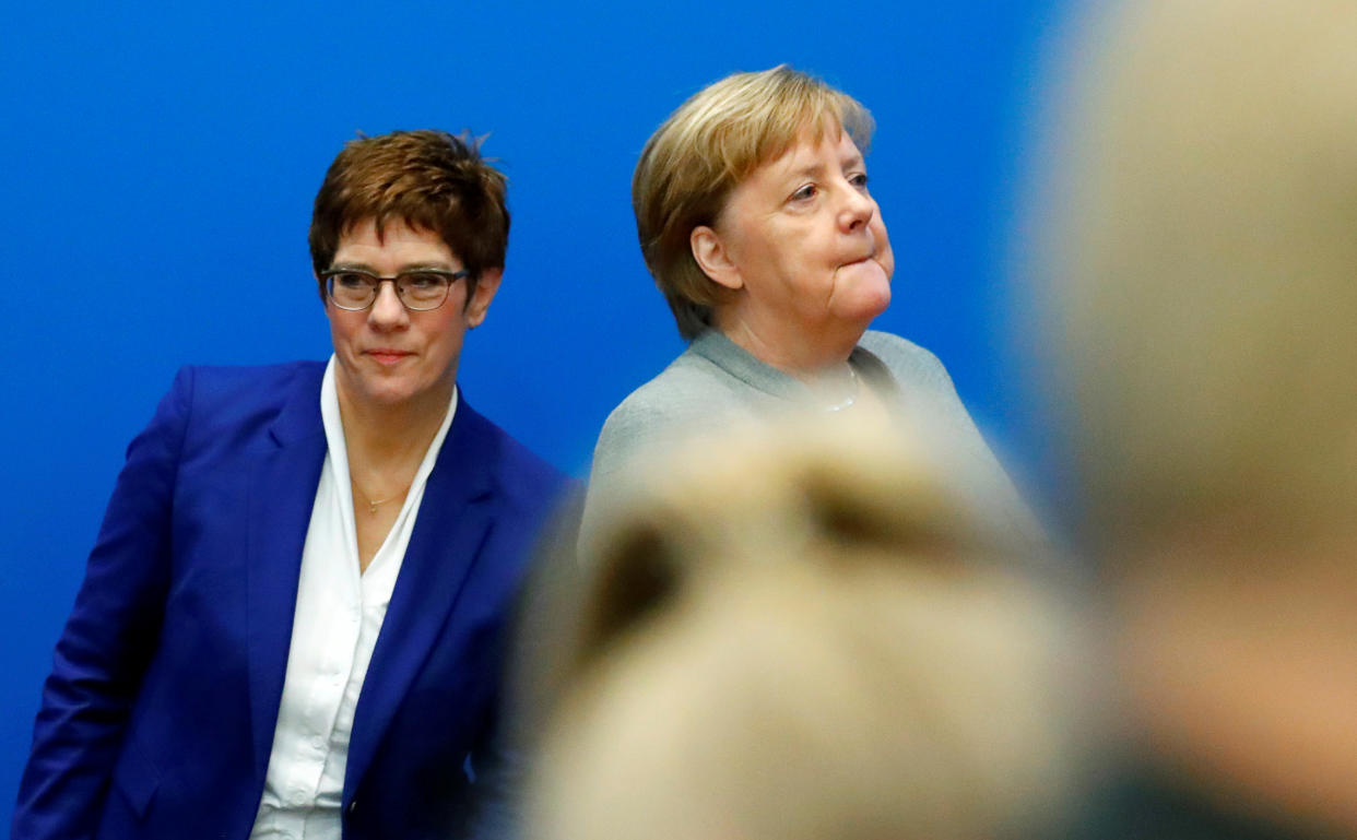 Outgoing leader of the Christian Democratic Union (CDU) Annegret Kramp-Karrenbauer and Germany's Chancellor Angela Merkel arrive for a board meeting at the party’s headquarters in Berlin, Germany February 10, 2020. REUTERS/Hannibal Hanschke