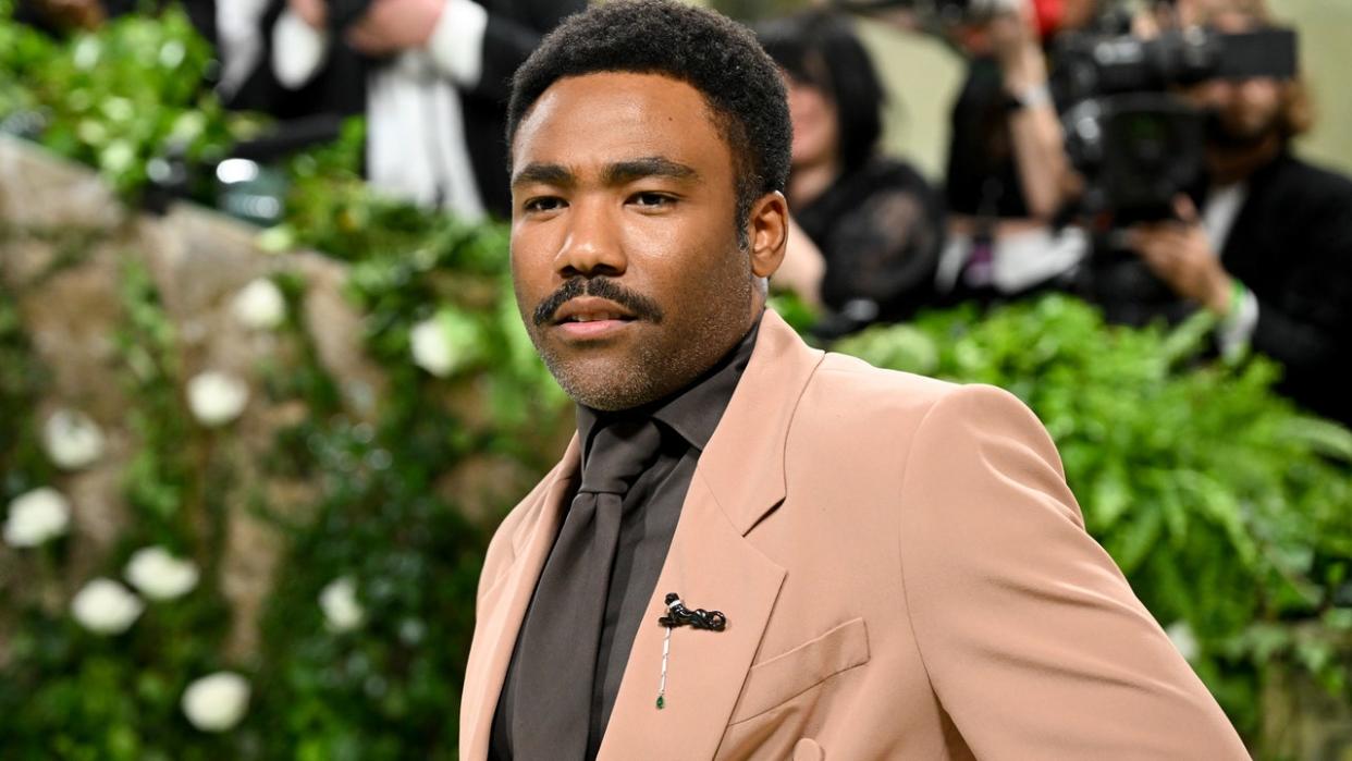 <div>Donald Glover at the 2024 Met Gala: "Sleeping Beauties: Reawakening Fashion" held at The Metropolitan Museum of Art on May 6, 2024 in New York City. (Photo by Gilbert Flores/Variety via Getty Images)</div>