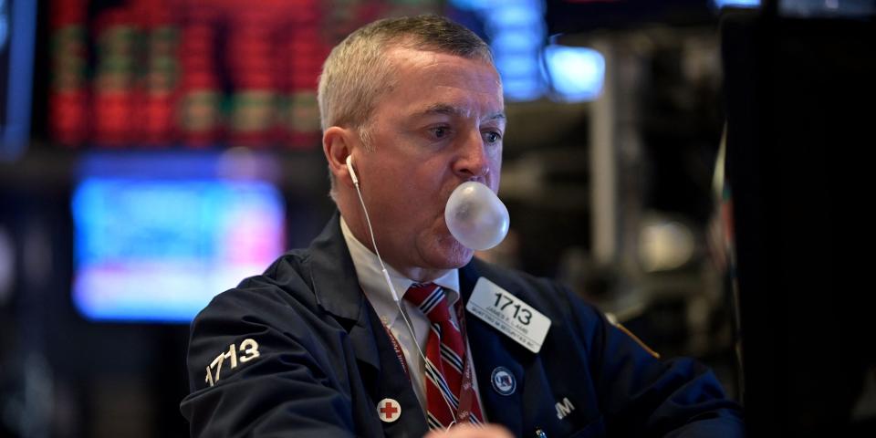 Image of a stock trader at the New York Stock Exchange.