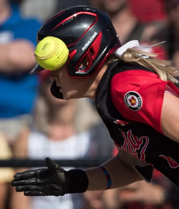 Canada's Victoria Hayward runs to first for a single on a bunt during first inning playoff action against Brazil at the 2019 Softball Americas Olympic Qualifier tournament in Surrey, B.C. (Darryl Dyck/The Canadian Press  - image credit)