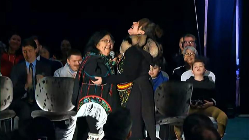 Throat singers share a laugh after singing during the opening of Thursday's devolution ceremony.