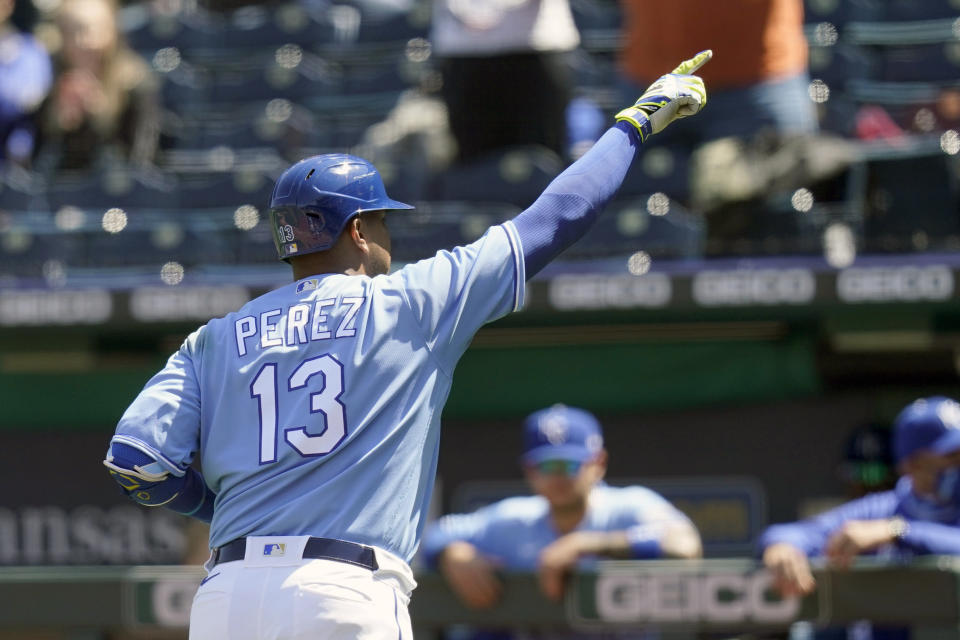 Kansas City Royals'wld Salvador Perez gestures while rounding the bases during the third inning of a baseball game against the Los Angeles Angels at Kauffman Stadium in Kansas City, Mo., Wednesday, April 14, 2021. Perez hit a solo home run off Los Angeles Angels starting pitcher Griffin Canning. (AP Photo/Orlin Wagner)