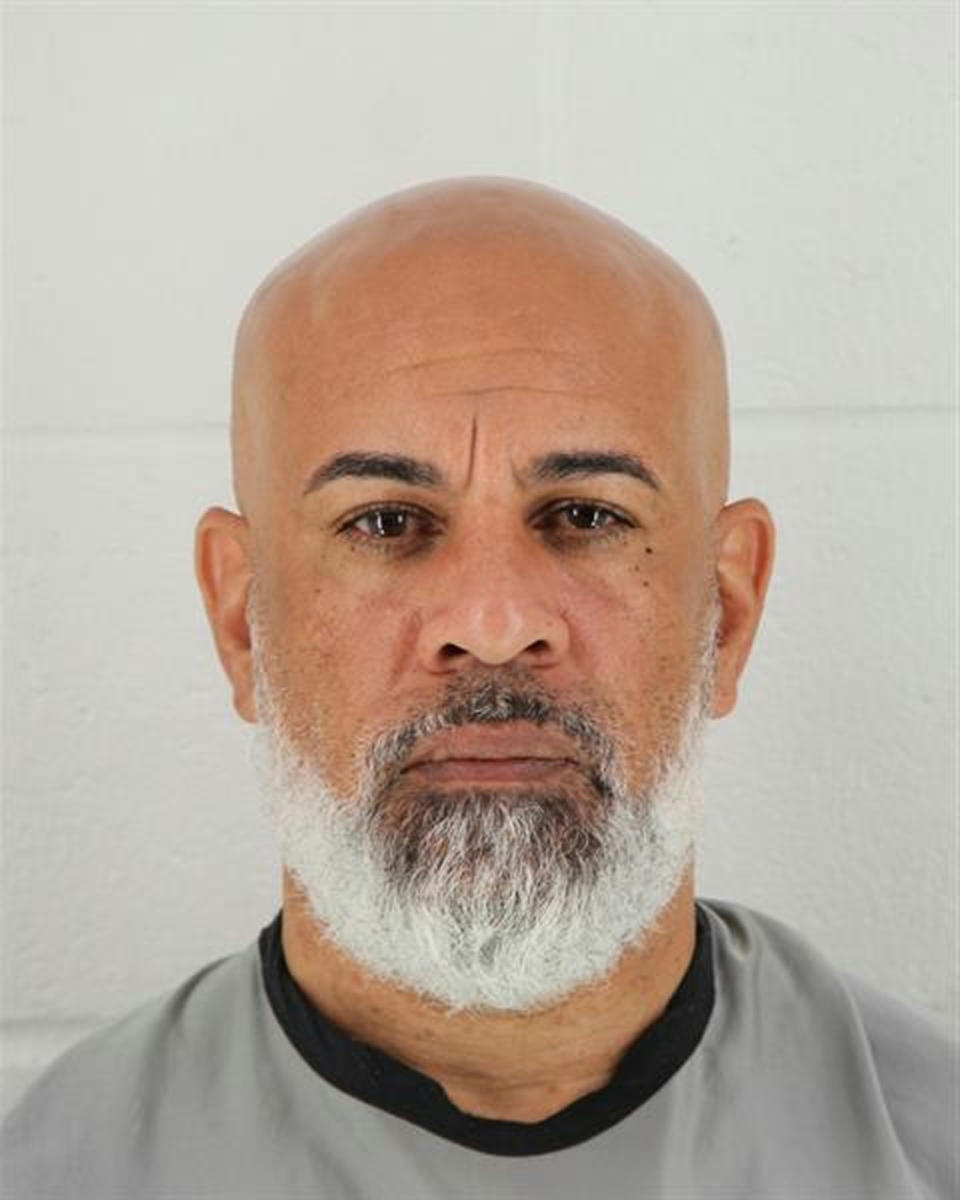 In this photo provided by the Johnson County, Kansas Sheriff's Office, Charles Pearson is pictured in a booking photo dated Oct. 8, 2018. Kansas City, Kansas, police have identified Pearson as the man they fatally shot near a popular shopping area after he said he had killed his wife. (Johnson County, Kansas Sheriff's Office via AP)