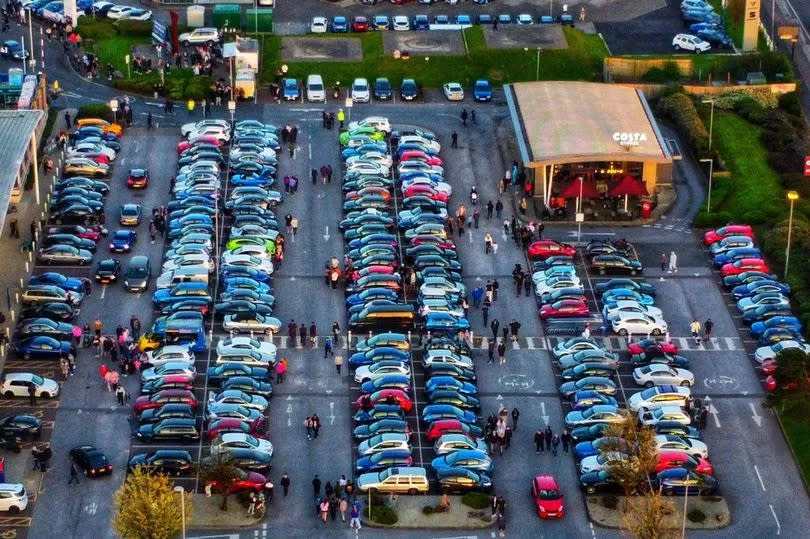 An aerial view of the One Last Ride car meet at Marsh Mills Retail Park, Plymouth – Source: droneguydevon24