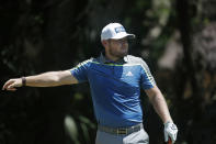 Tyrrell Hatton reacts after hitting off the second tee during the third round of the RBC Heritage golf tournament, Saturday, June 20, 2020, in Hilton Head Island, S.C. (AP Photo/Gerry Broome)