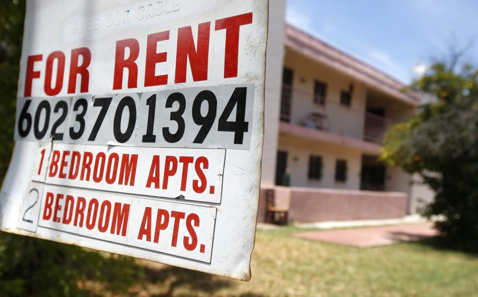 A rental sign is posted in front of an apartment complex Tuesday, July 14, 2020, in Phoenix.   (AP Photo/Ross D. Franklin)