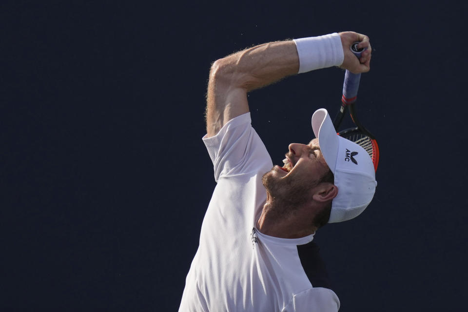 Britain's Andy Murray serves to Australia's Max Purcell during the National Bank Open men’s tennis tournament Wednesday, Aug. 9, 2023, in Toronto. (Chris Young/The Canadian Press via AP)