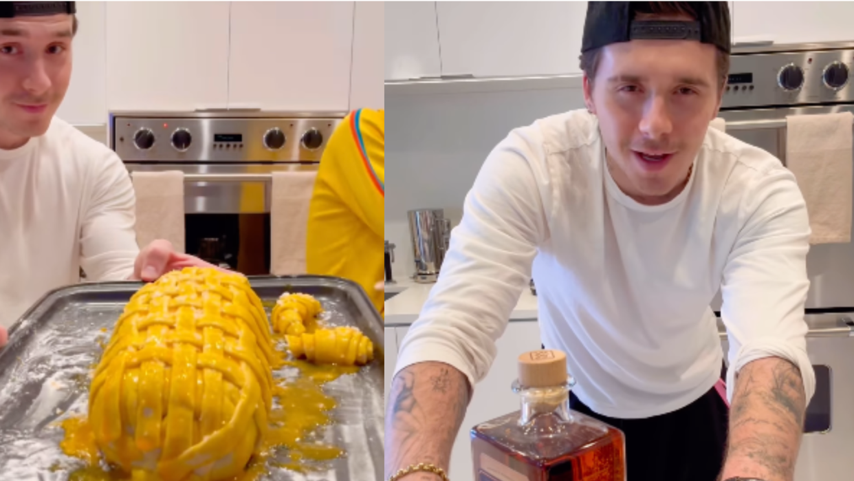 a couple of men in a kitchen