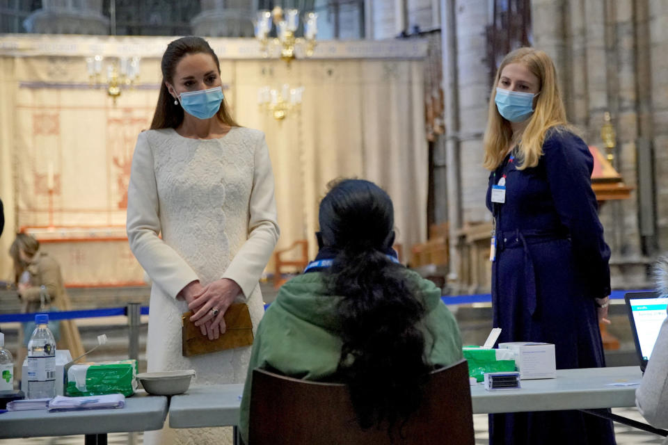 Britain's Catherine, Duchess of Cambridge speaks to staff during a visit to the coronavirus vaccination centre at Westminster Abbey, central London on March 23, 2021, to pay tribute to the efforts of those involved in the Covid-19 vaccine rollout. (Photo by Aaron Chown / POOL / AFP) (Photo by AARON CHOWN/POOL/AFP via Getty Images)