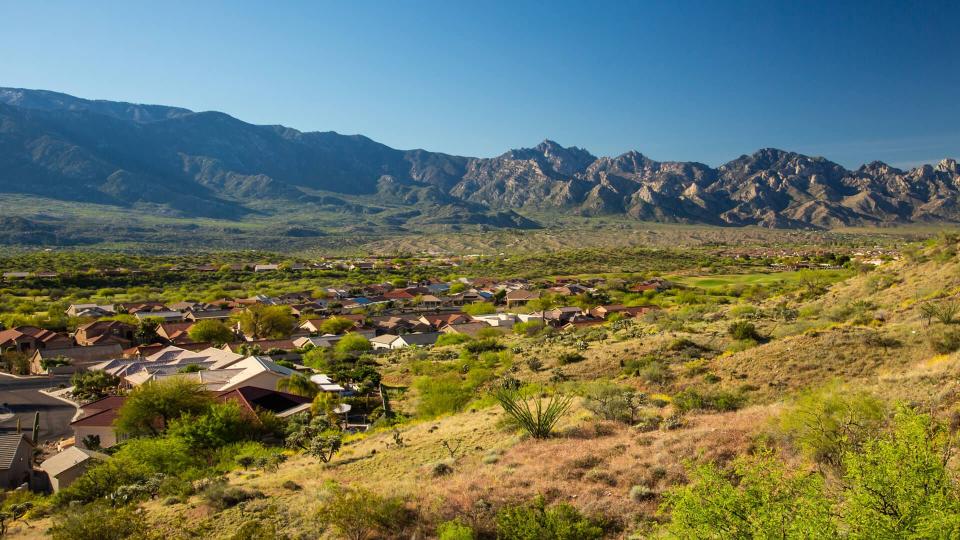 A high angle view of the town of Saddlebrook, Arizona and the Snta catalina mountains, near Tucson - Image.