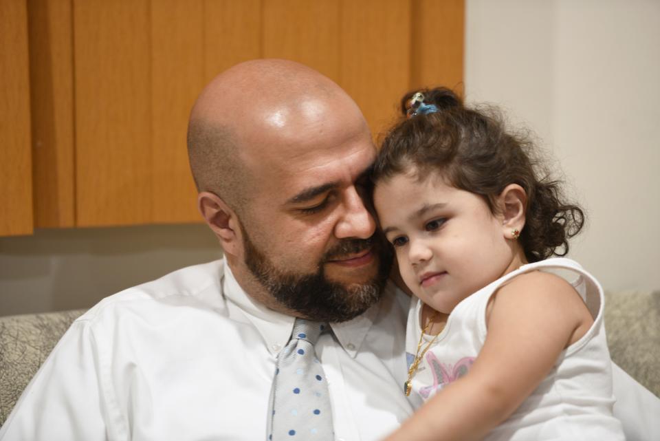 Mohamed Khairullah, mayor of Prospect Park, New Jersey, was traveling home from Turkey last month with his wife and kids when he said he was held and questioned for three hours about his work and his travel. Khairullah is pictured with his daughter, Ahid.