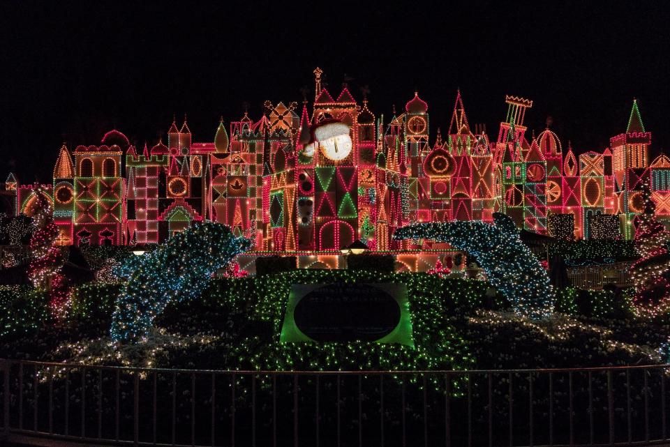 The It's A Small World Ride with colorful lights decorated on the outside