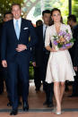 Kate wears a beautiful hand-painted pink and white Jenny Packham dress that is inspired by the kimono. The dress is covered in flowers which may be intentional because the royals were visiting the Singapore Botanic Gardens on Sept. 11. (Photo by Samir Hussein/WireImage)