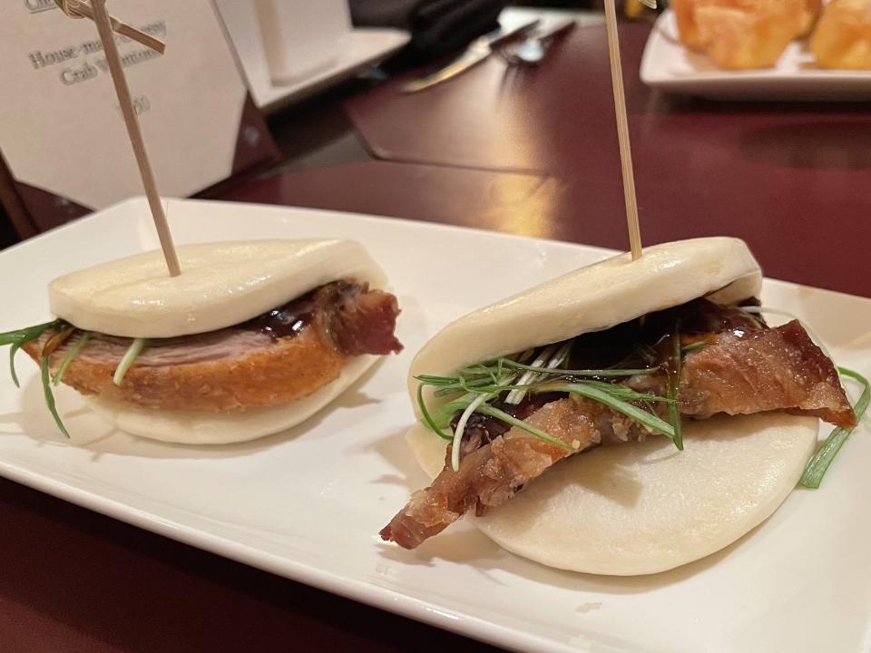 Two crispy duck bao buns from Nine Dragons.