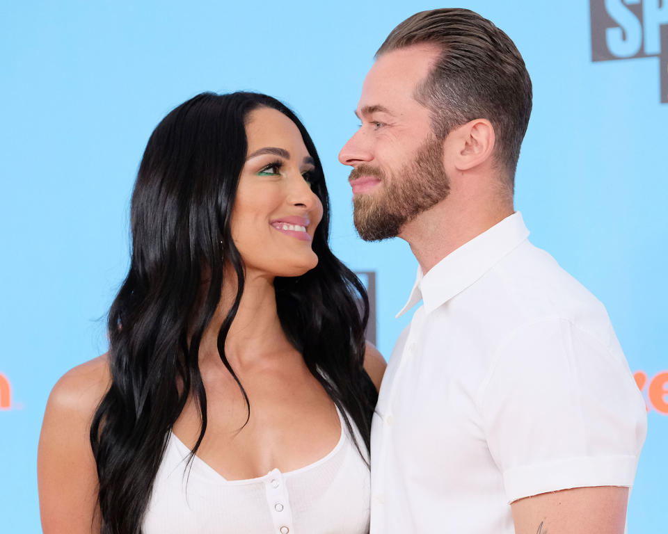 "We said I DO," Nikki announced via Instagram, sharing photos from the couple's Paris nuptials. She also revealed that fans can see the "entire journey" during a four-part special event series from E! called Nikki Bella Says I Do.
