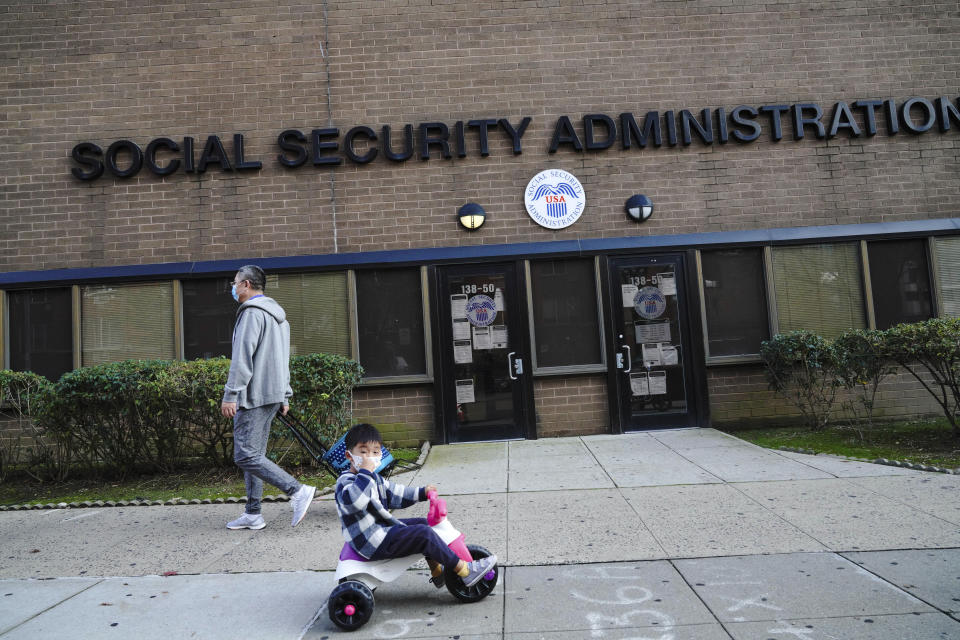 Photo by: John Nacion/STAR MAX/IPx 2020 10/20/20 A view of a child riding a bike in front of the New York State Social Security Administration in Flushing, Borough of Queens, New York City on October 20, 2020. Social Security Announces 1.3 Percent Benefit Increase for 2021.
