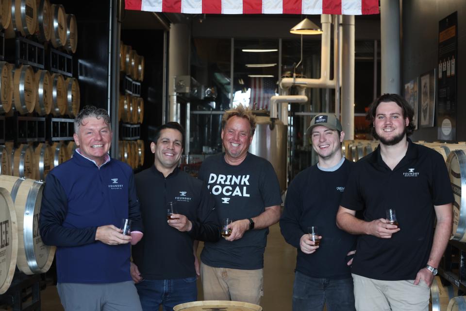 Shown here at Foundry Distilling Company in West Des Moines, Iowa, are: Scott Bush, owner and founder; Andrew Tomes, head of sales; Richie Allen, Iowa brand ambassador; Brandon Cook, apprentice distiller; and
Brian Kuhn, head distiller.