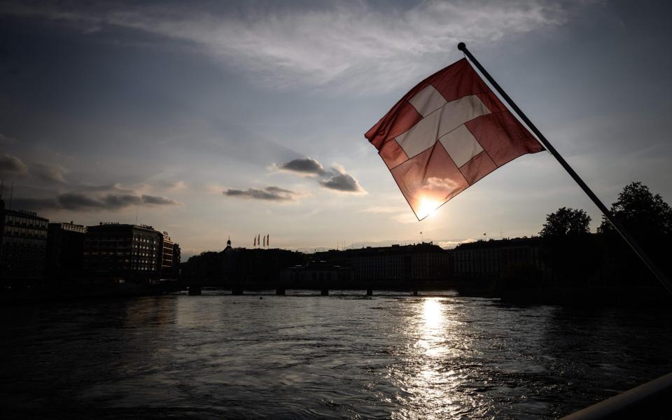 The Rhone river at sunset after Switzerland started a second phase to ease lockdown restrictions - FABRICE COFFRINI/AFP