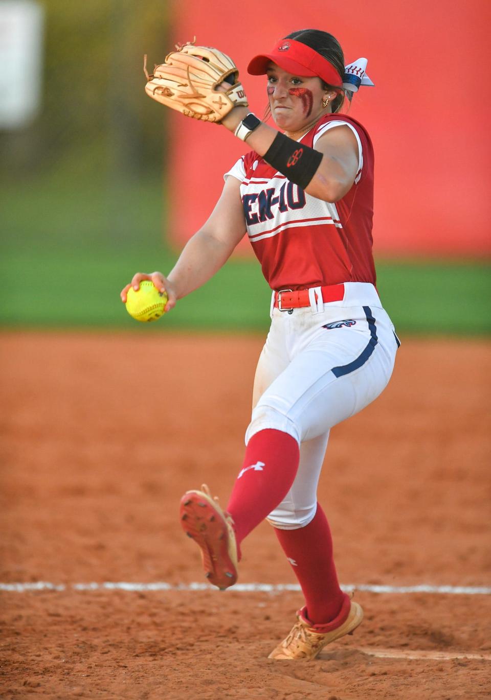 Centennial’s Hailey Brereton (23) delivers to the plate in a high school softball game against Jensen Beach, Wednesday, Feb. 21, 2024, in Port St. Lucie.