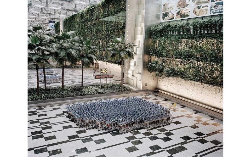 A baggage-reclaim area in Singapore Changi Airport, where more than 15,000 people are employed. | Giulio Di Sturco/INSTITUTE