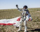 Felix Baumgartner of Austria celebrates after successfully completing his jump from the edge of space for Red Bull Stratos in Roswell, New Mexico, in this photo provided by www.redbullcontentpool.com. Baumgartner became the first man to break the sound barrier in a record-shattering, death-defying freefall jump