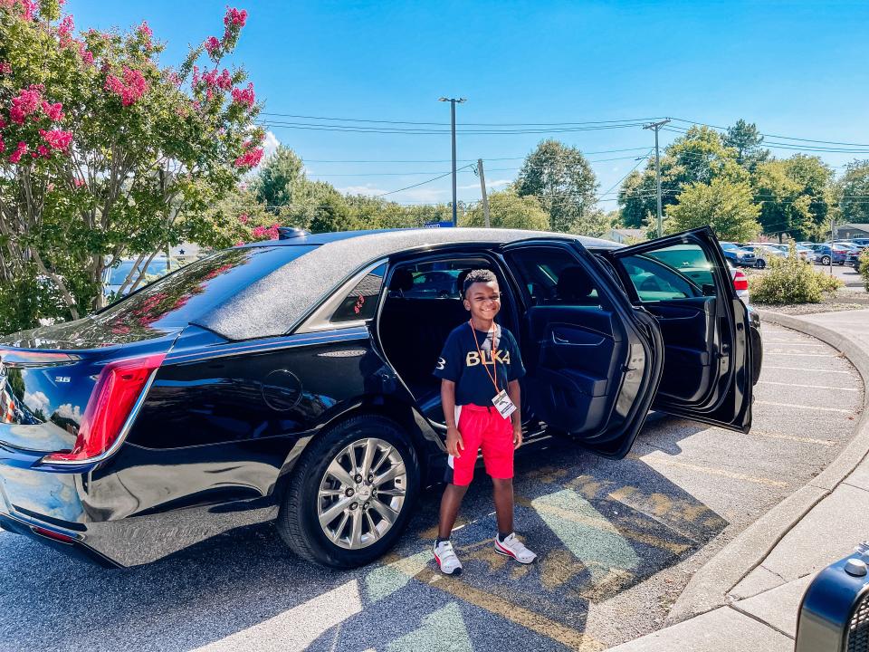 Fourth grader Maxwell Dorsey gets to “pull up” to the Dogwood Elementary School Back to School Premiere event in a limo on Aug. 3, 2022.